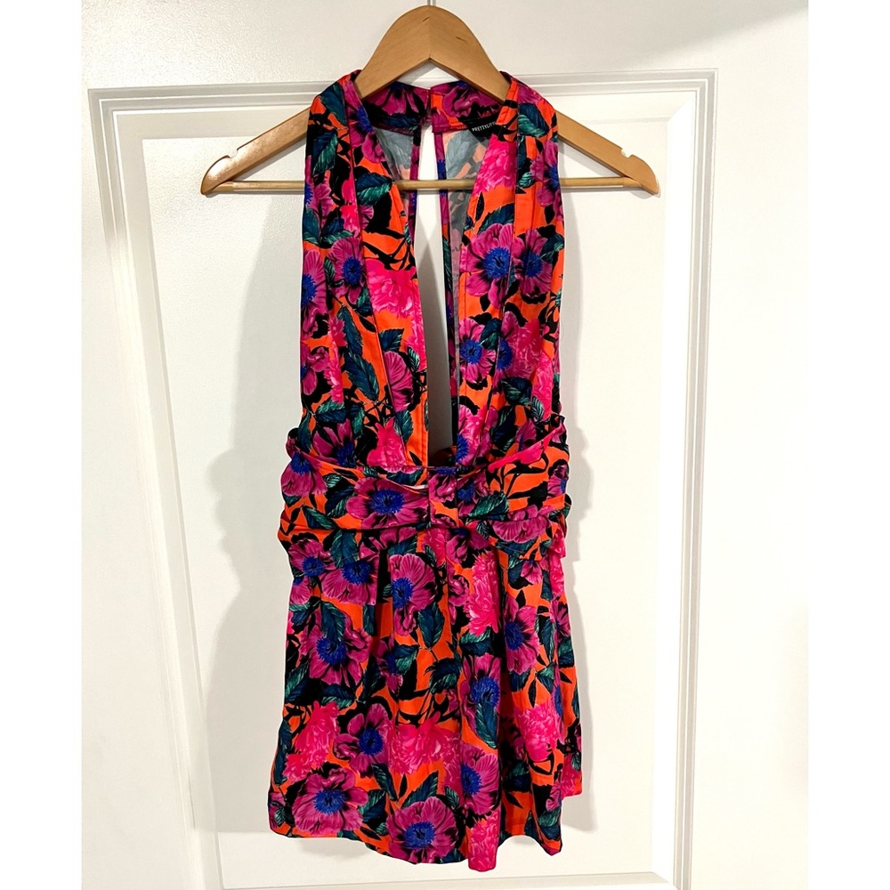 Pretty little thing - Multcolor Romper Size 4 - Never worn!